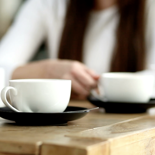 Drinking coffee in a cafe